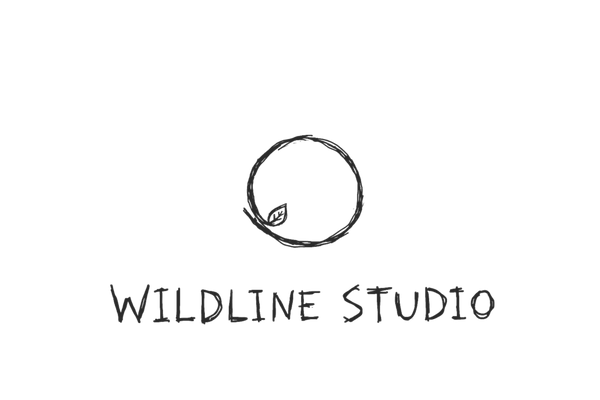 A minimalist black logo featuring a small hand-drawn circle with a leaf and the text 'WILDLINE STUDIO' centered on a solid white background.
